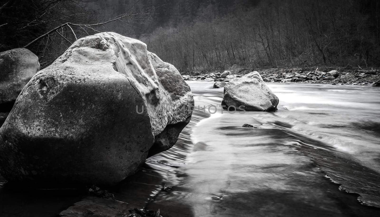 beautiful landscape with mountain clear river and stones