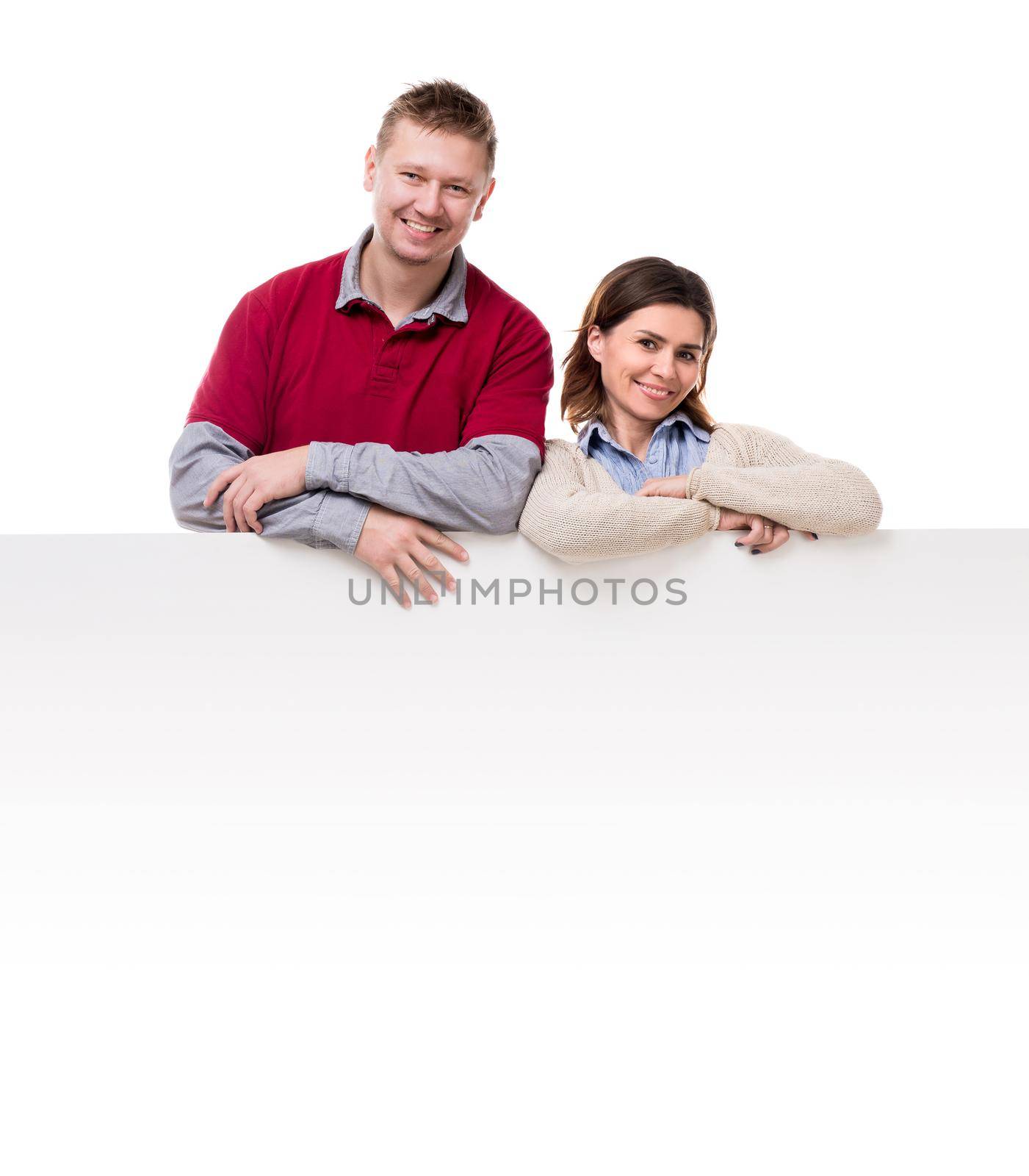 smiling couple lean on empty blanket for ad by GekaSkr