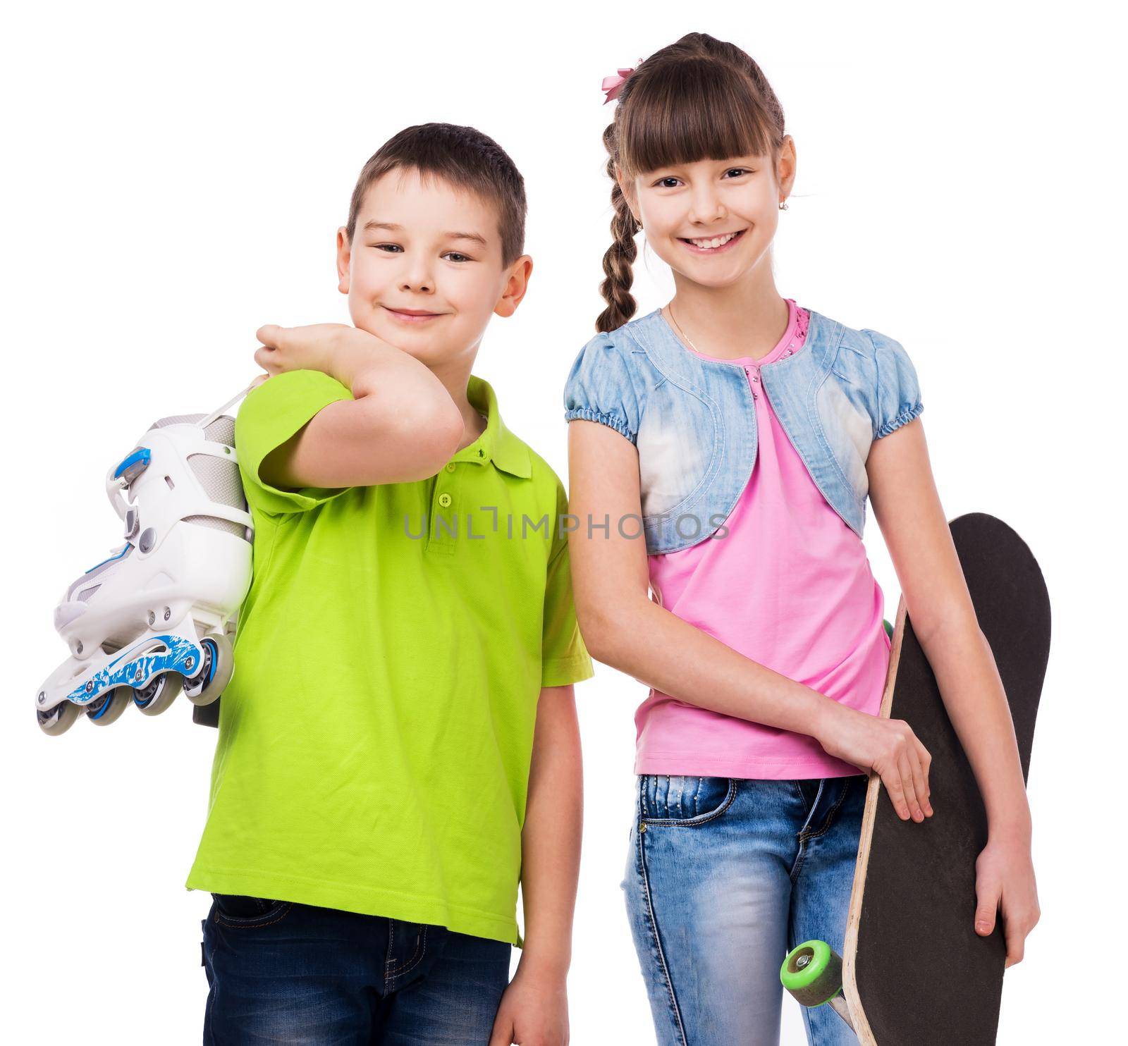 smiling boy and girl with skate and rollers isolated on white background