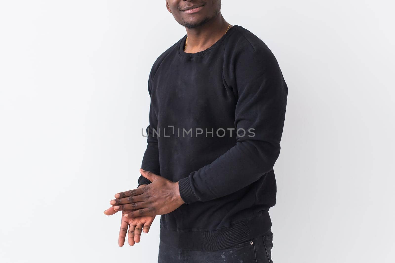 Young handsome african american man with an afro hairstyle. Portrait on white background