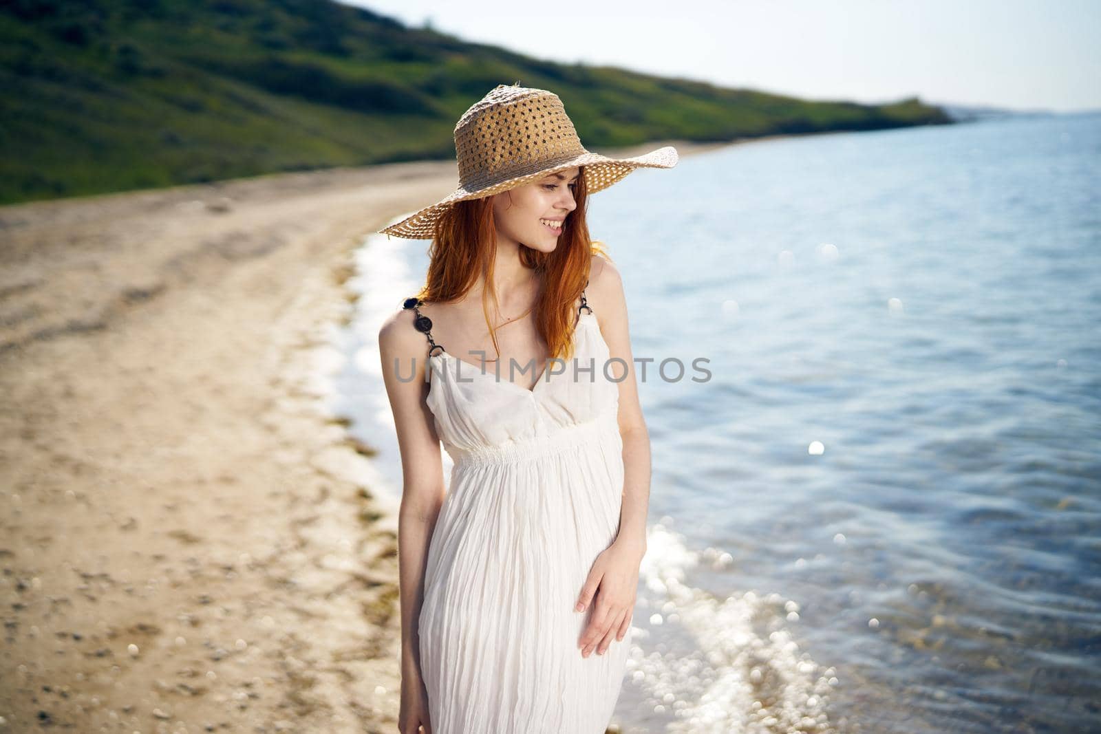 pretty woman with hat on island beach ocean summer fun. High quality photo