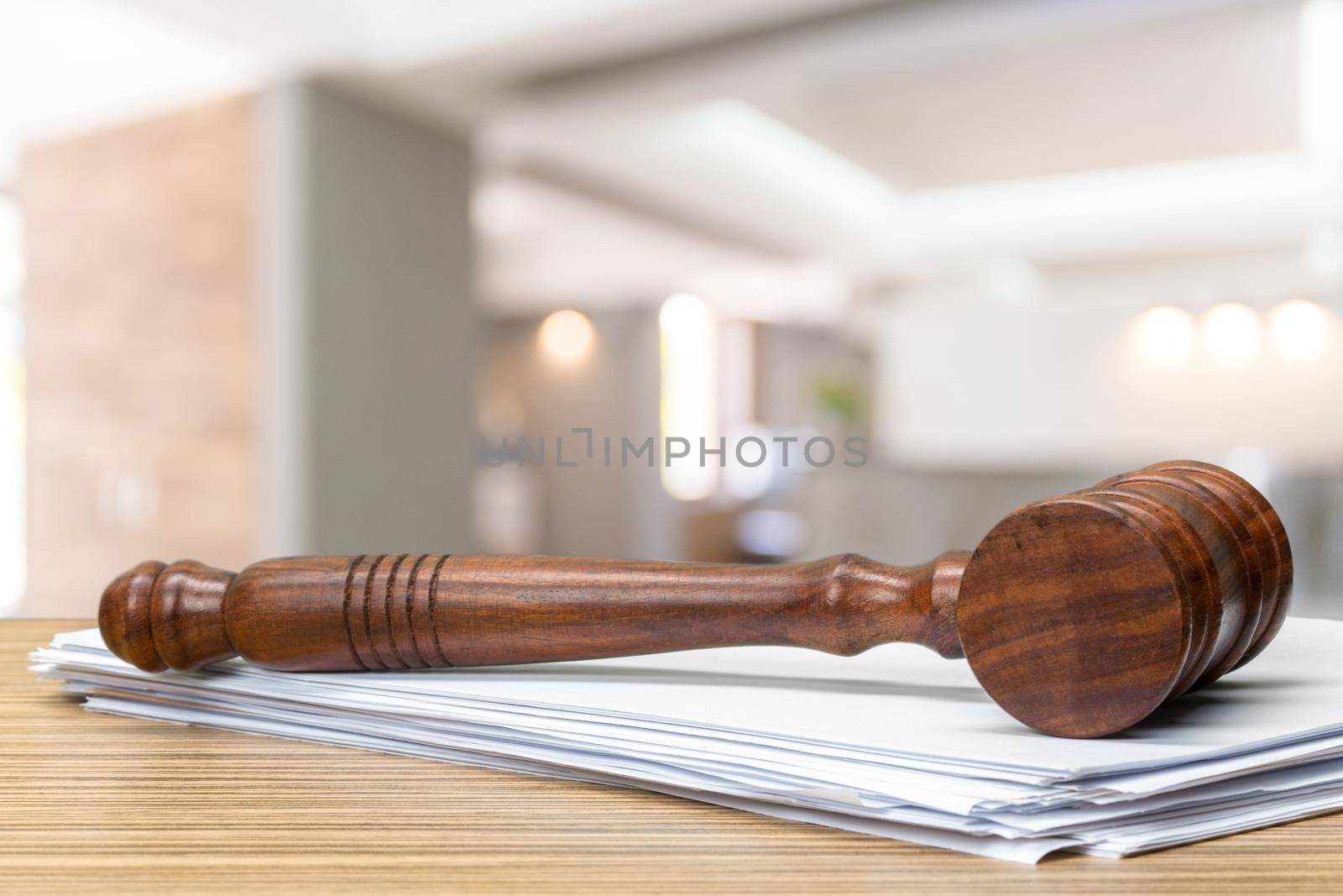 Wooden gavel on table close up. Justice concept