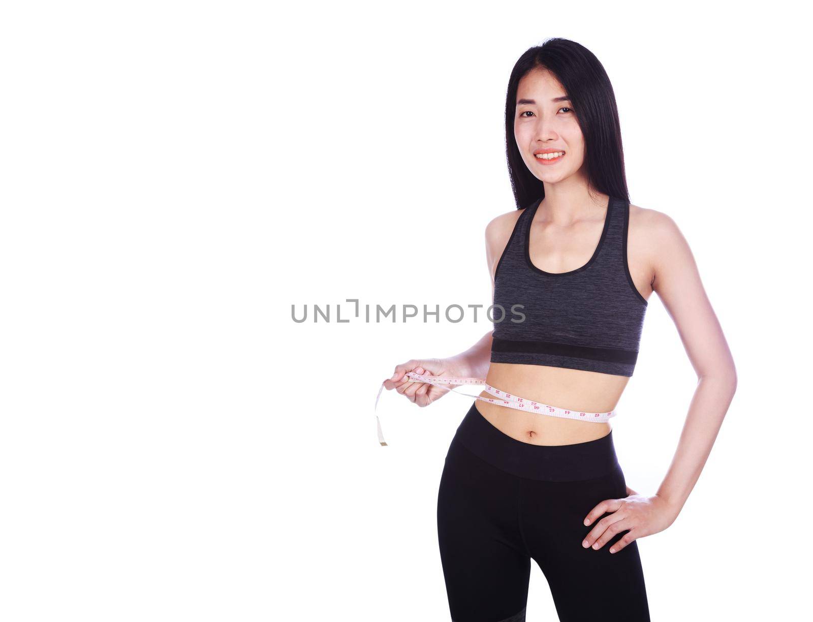 woman measuring waist with tape isolated on white background (diet concept)