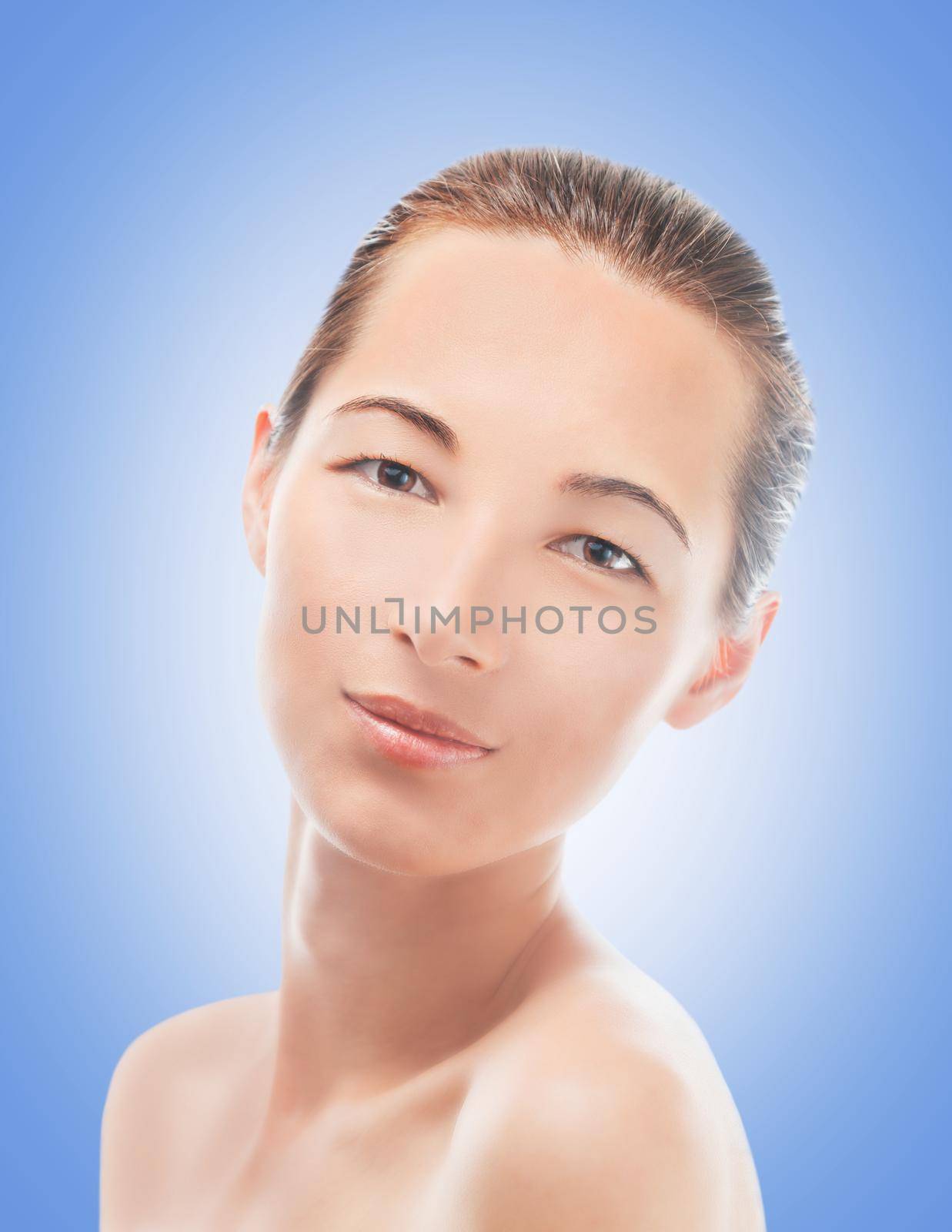 Portrait of young beautiful woman with healthy smooth skin