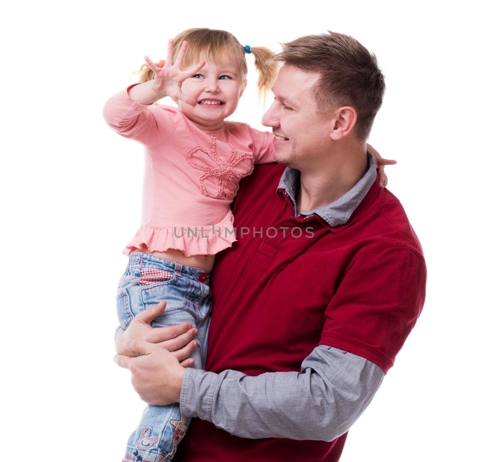 father holding little daudgter in his arms isolated on white background