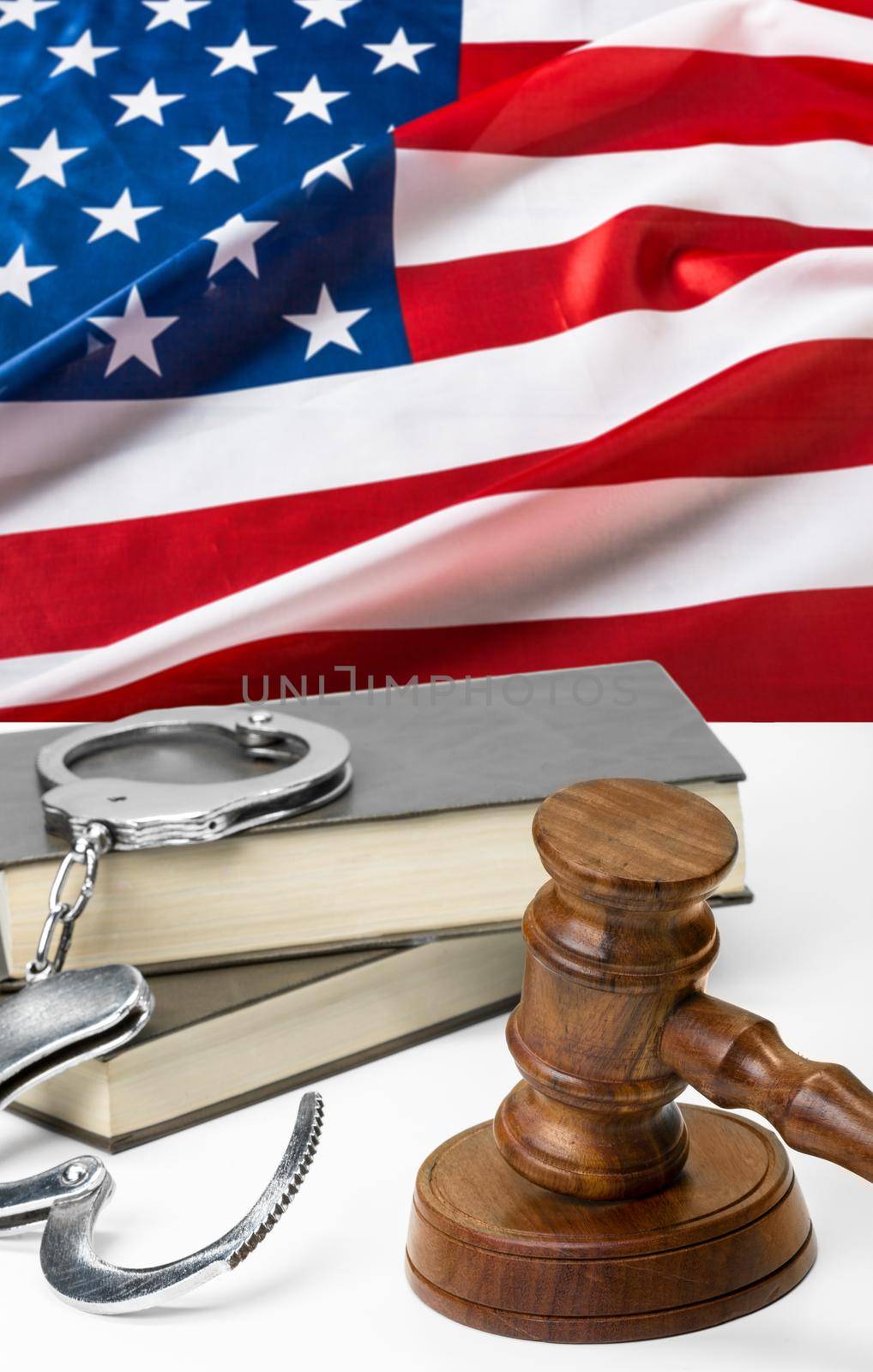 Wooden judge gavel on table, front close-up view