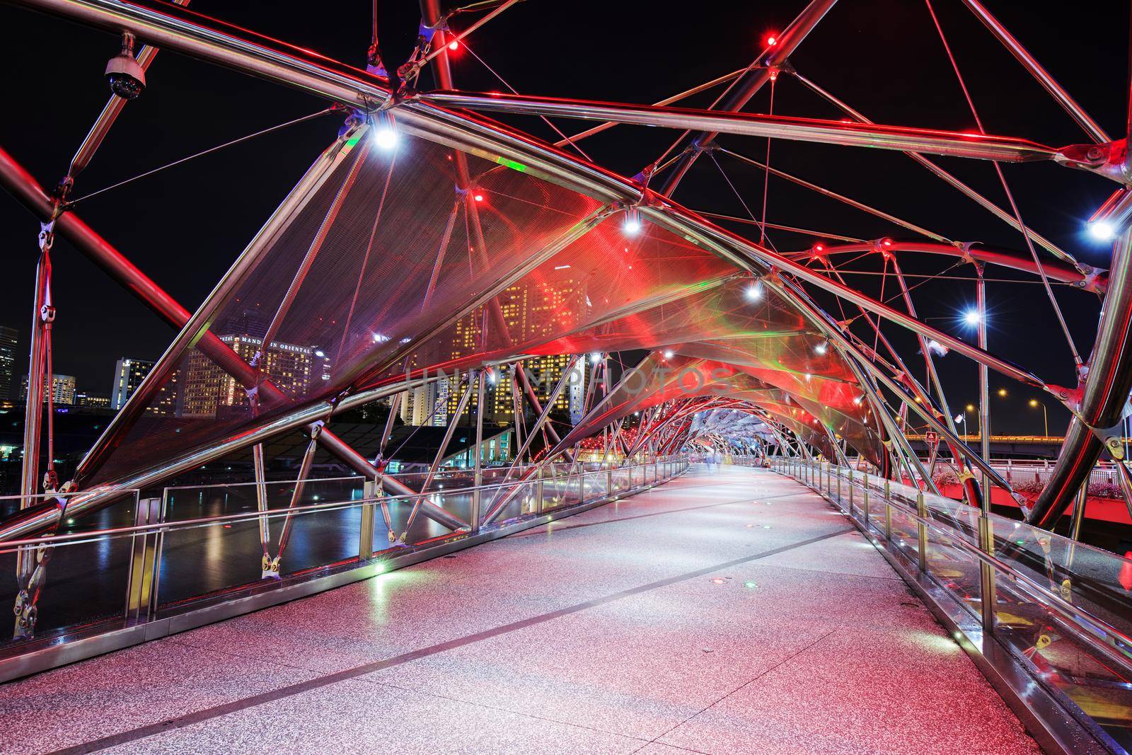 The Helix bridge at night in Singapore city