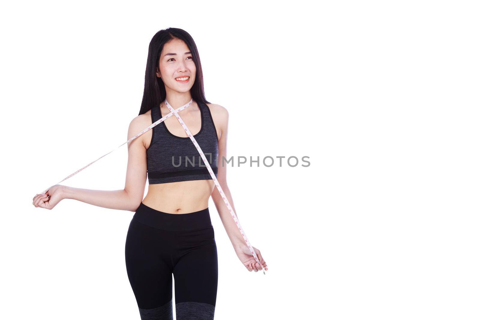 fitness woman with tape measure around her neck isolated on a white background
