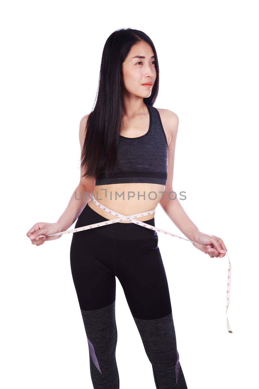 woman measuring waist with tape isolated on white background (diet concept)