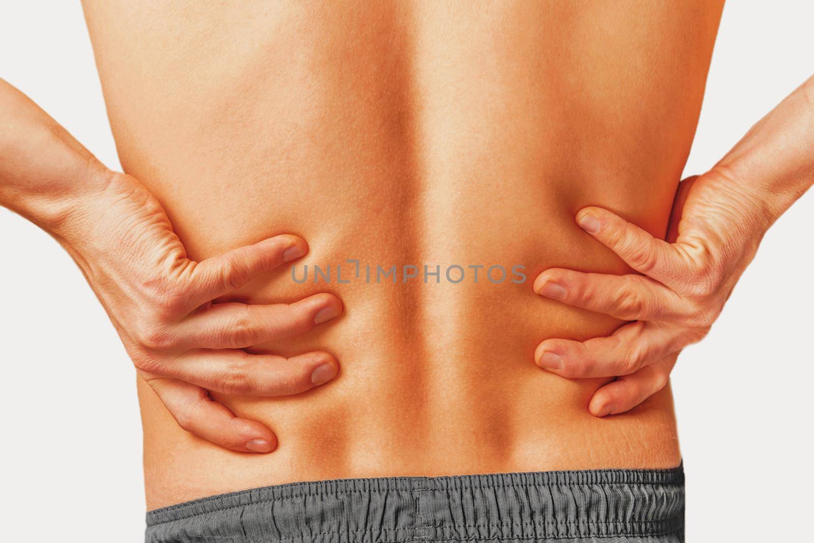 Acute pain in a male lower back.