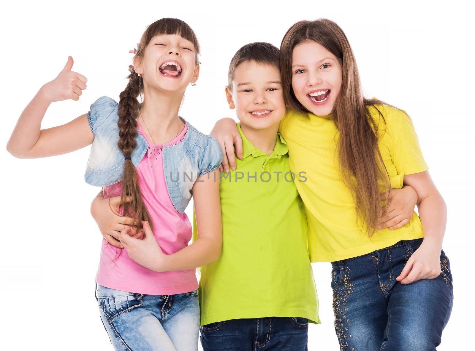 little cute boy embracing two laughing little girls isolated on white background