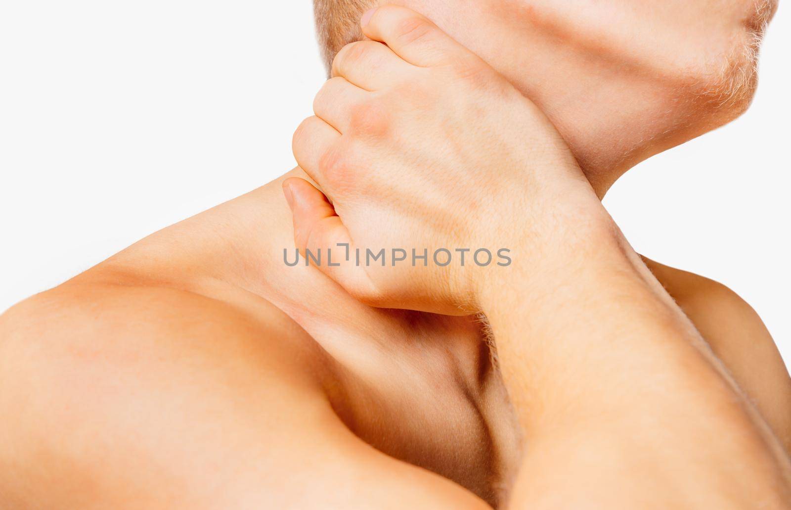 Unrecognizable man holds neck, pain in the neck, side view. On a white background