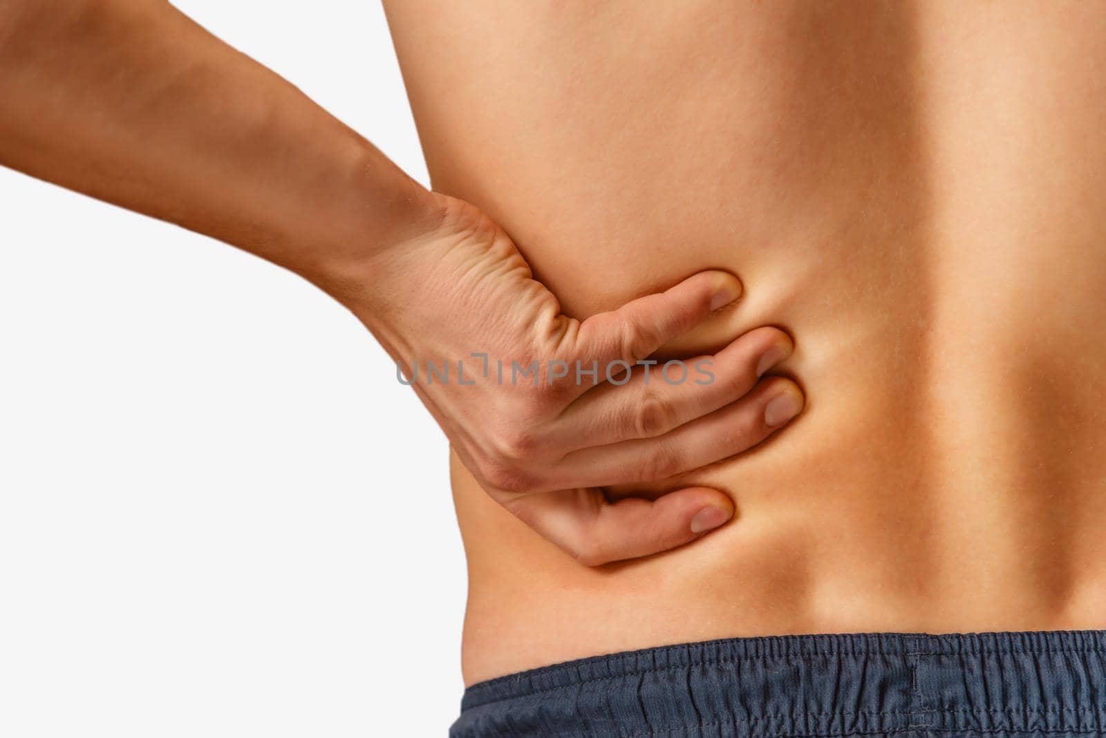Man touches the lower back, pain in the kidney. On a white background