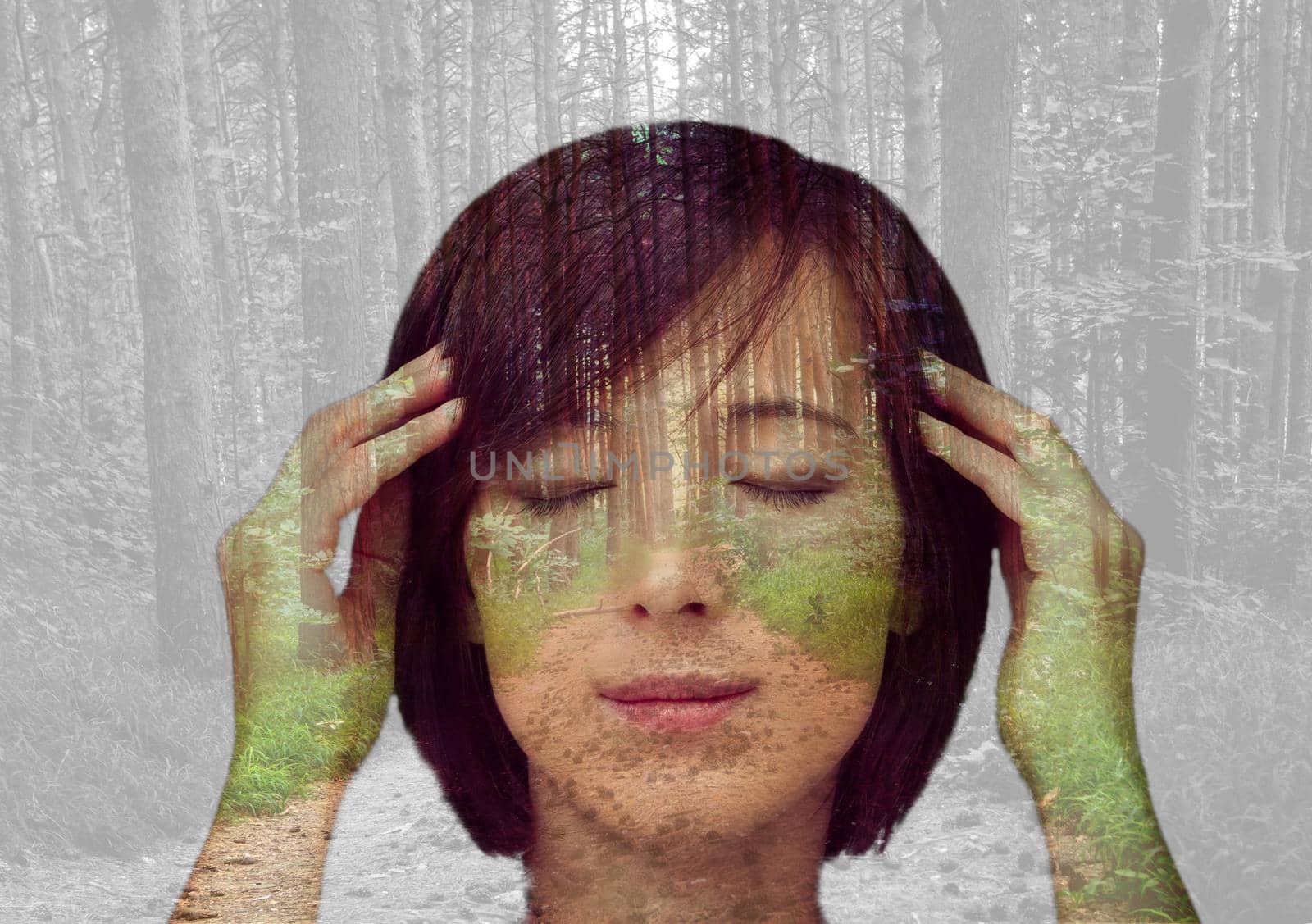 Double exposure portrait of pensive girl combined with image of trees in the forest