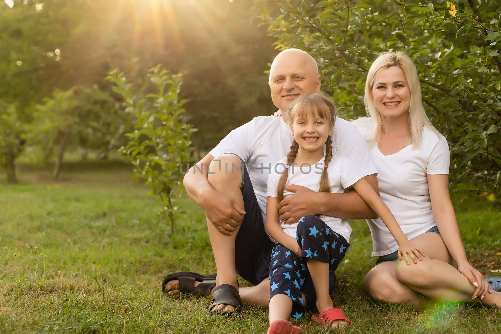 Happy family enjoying in park on sunny a day