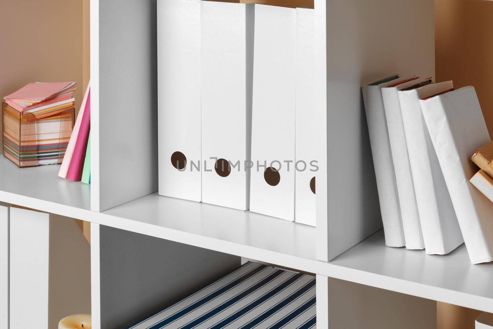 Home office working space. white shelf with accessories