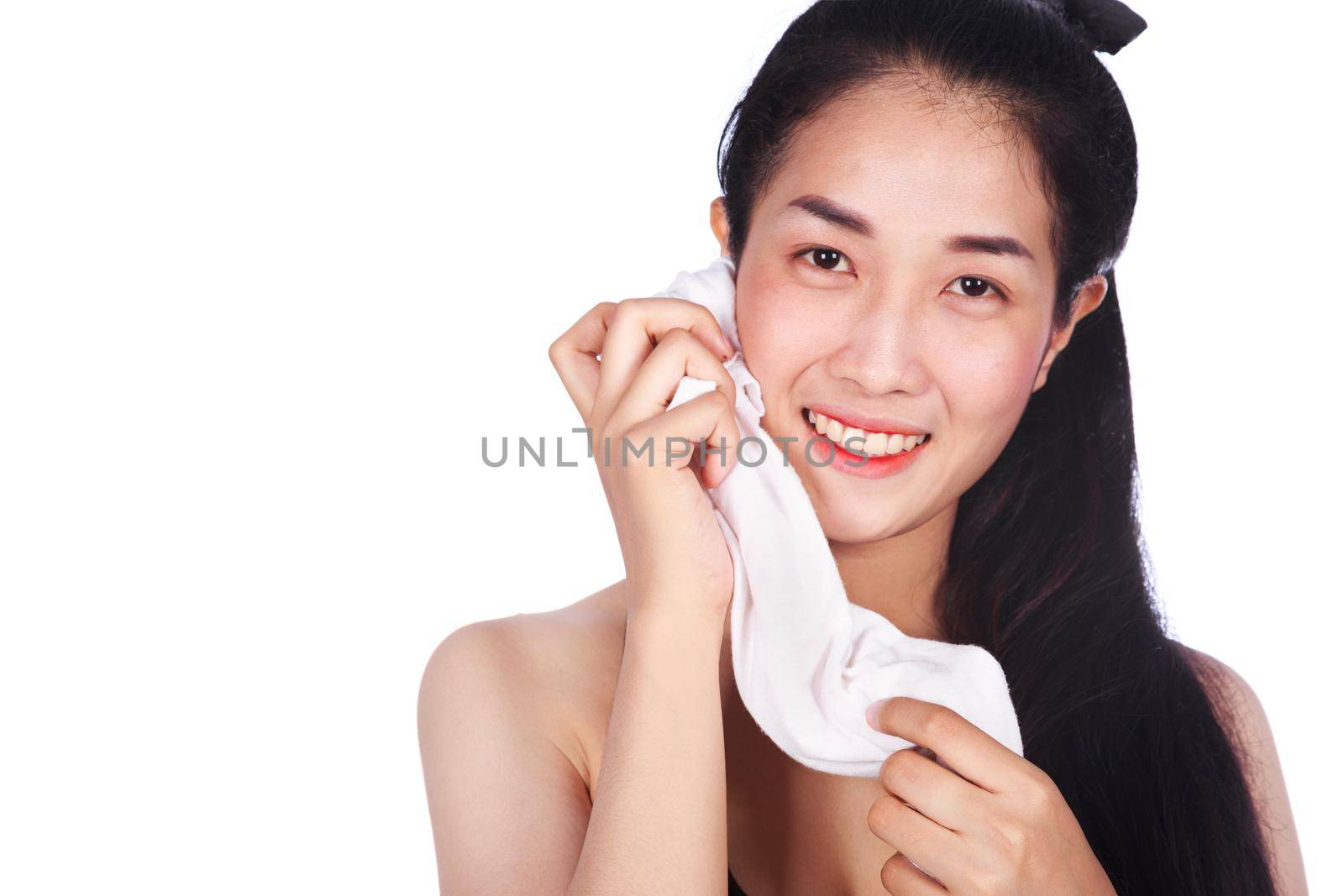 young sporty woman with a towel isolated on a white background