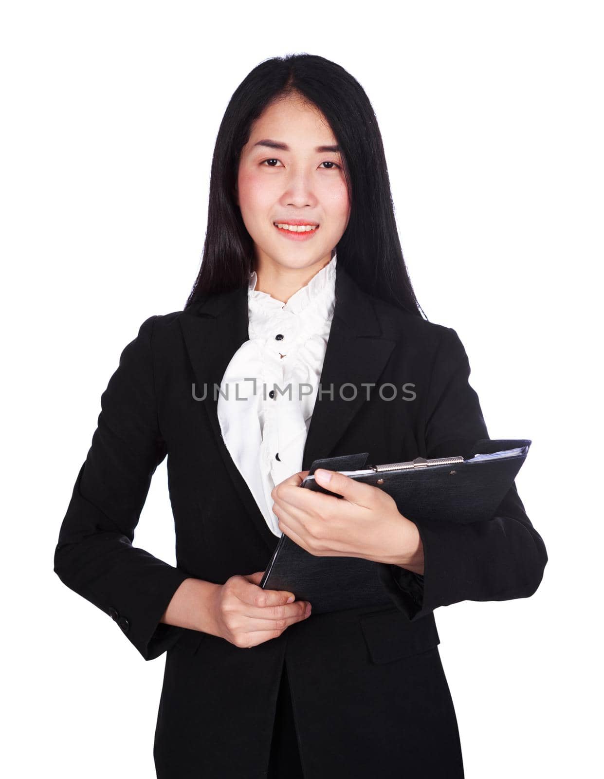 smiling business woman in suit holding a clipboard isolated on a white background