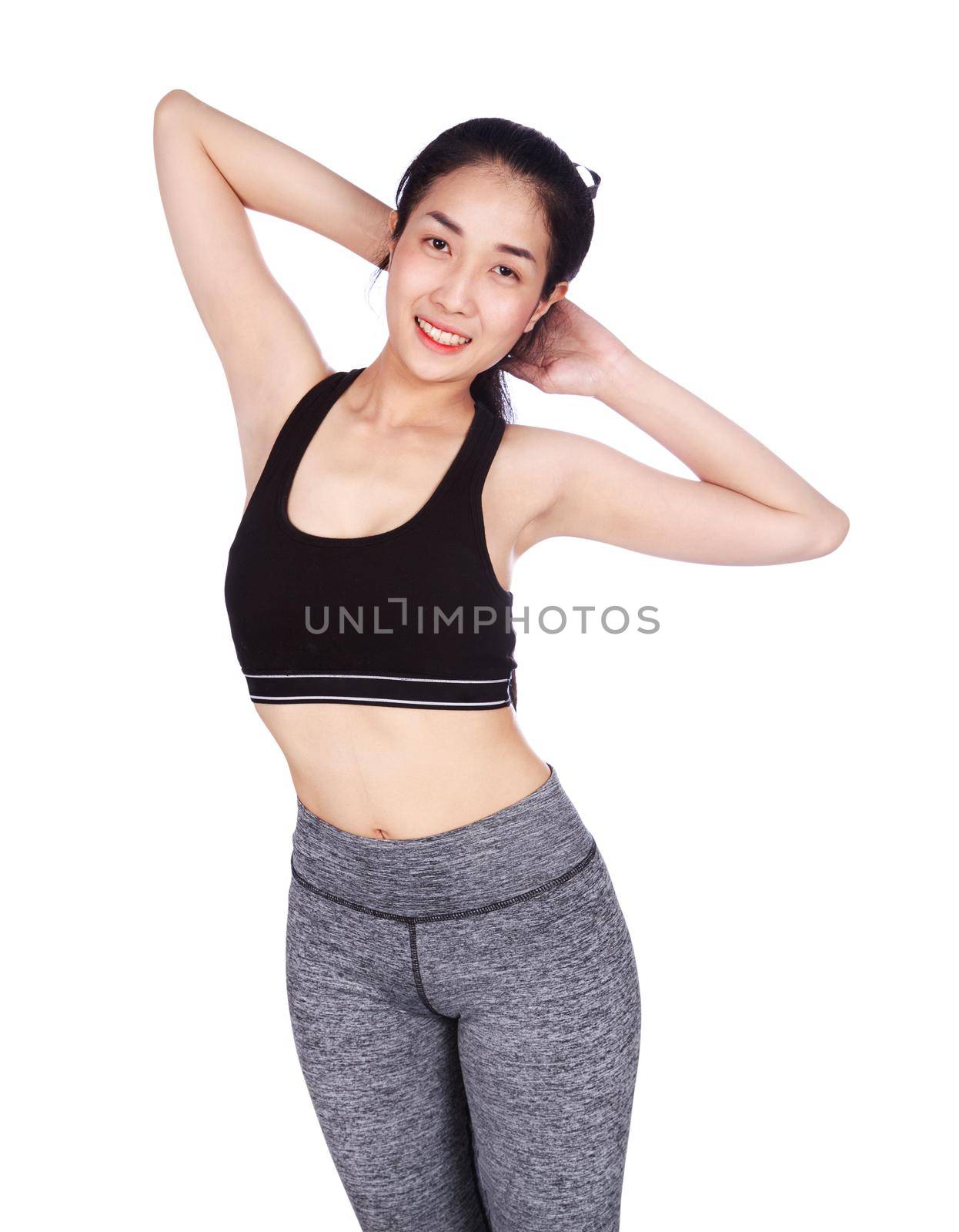 fitness woman stretching the muscles of her arms isolated on white background by geargodz
