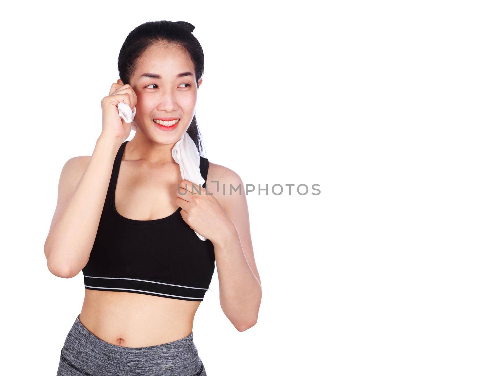 young sporty woman with a towel isolated on a white background