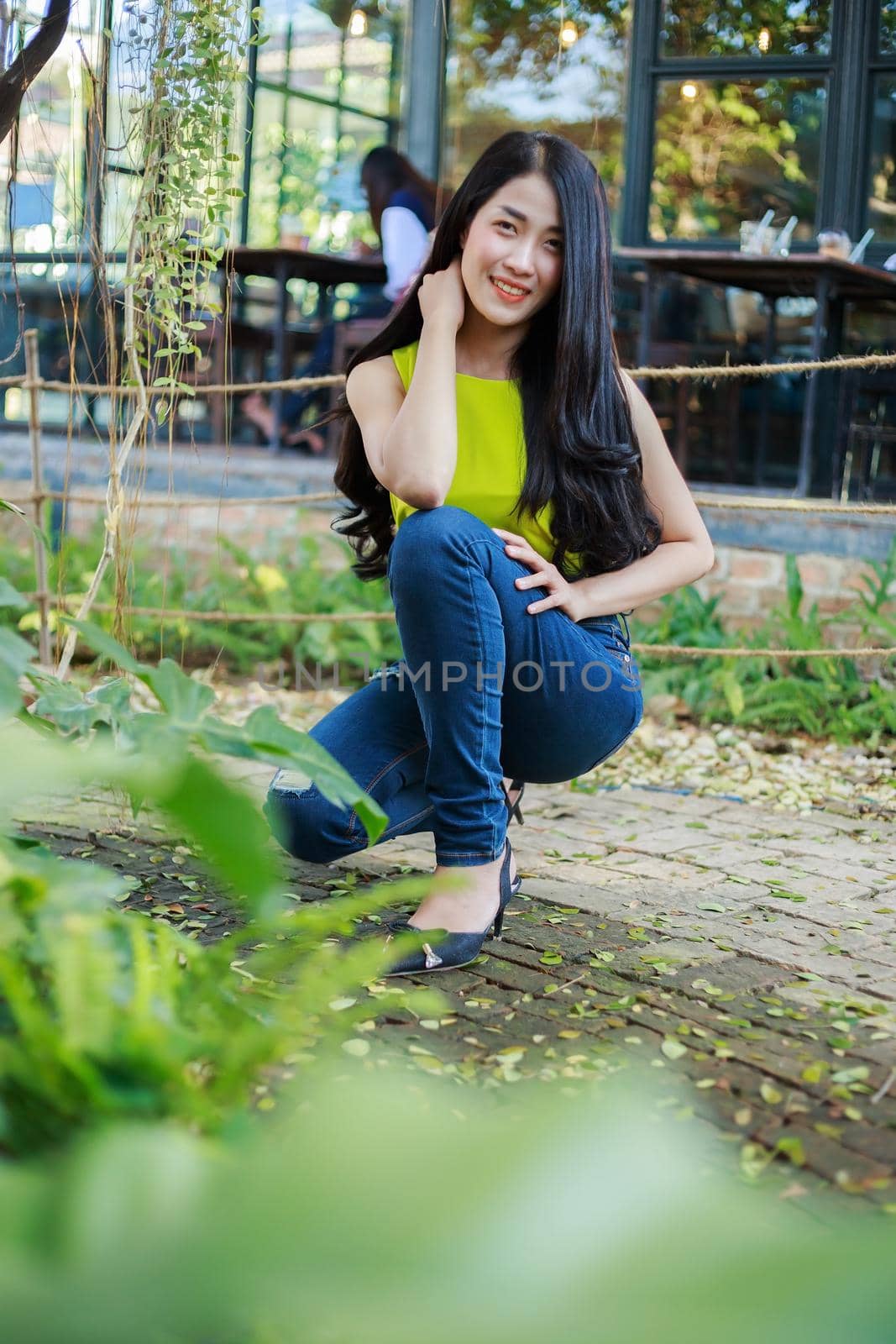 portrait of beautiful asian woman in the garden