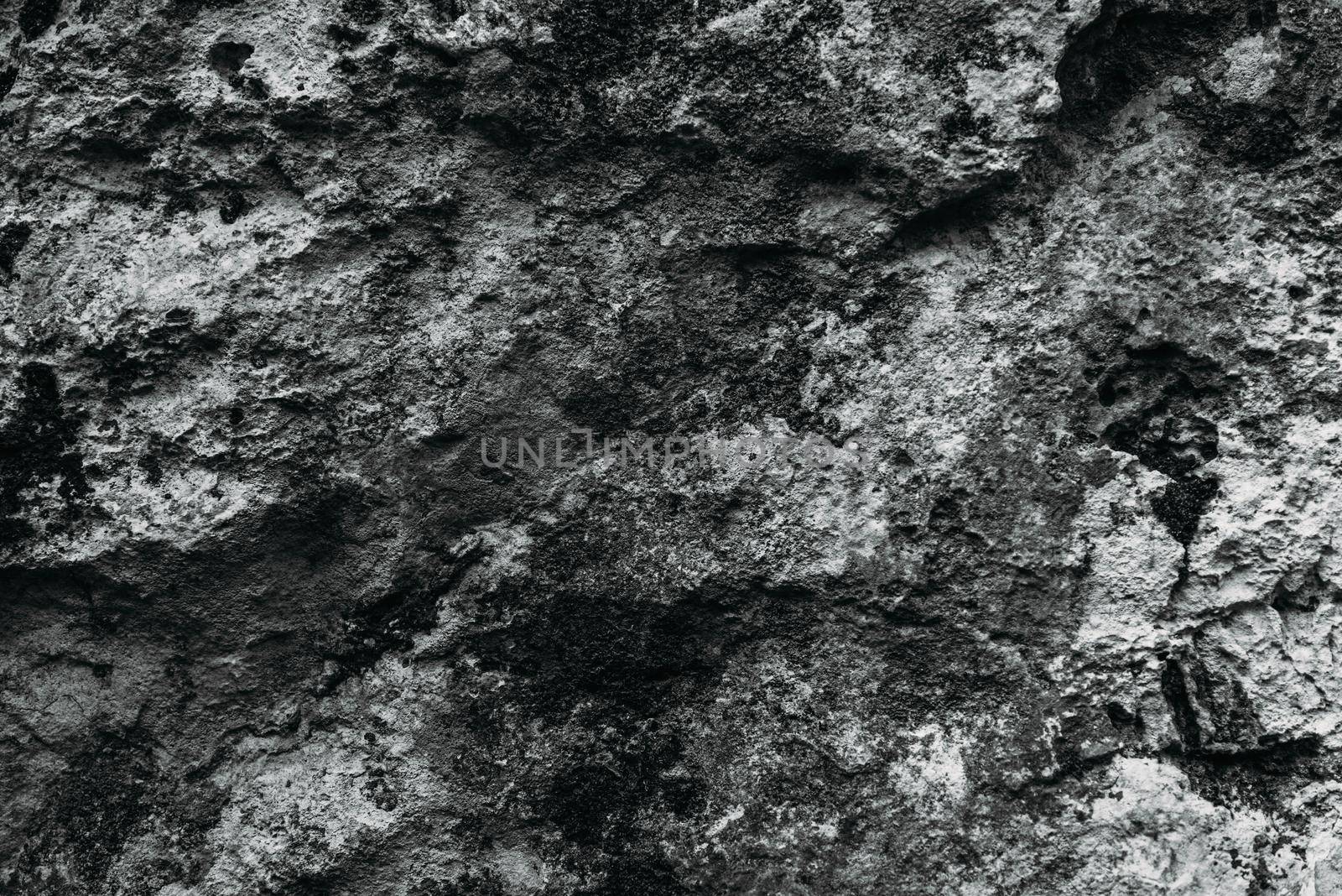 Rough stone background, texture, black and white image