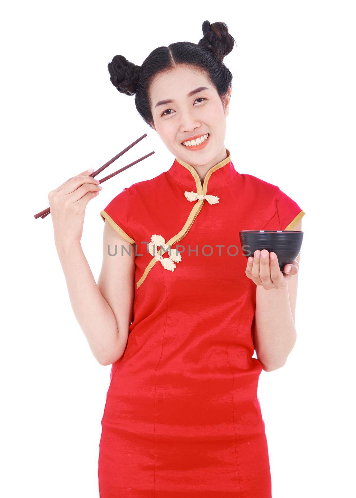 happy woman wearing chinese cheongsam dress with chopsticks and bowl isolated on a white background