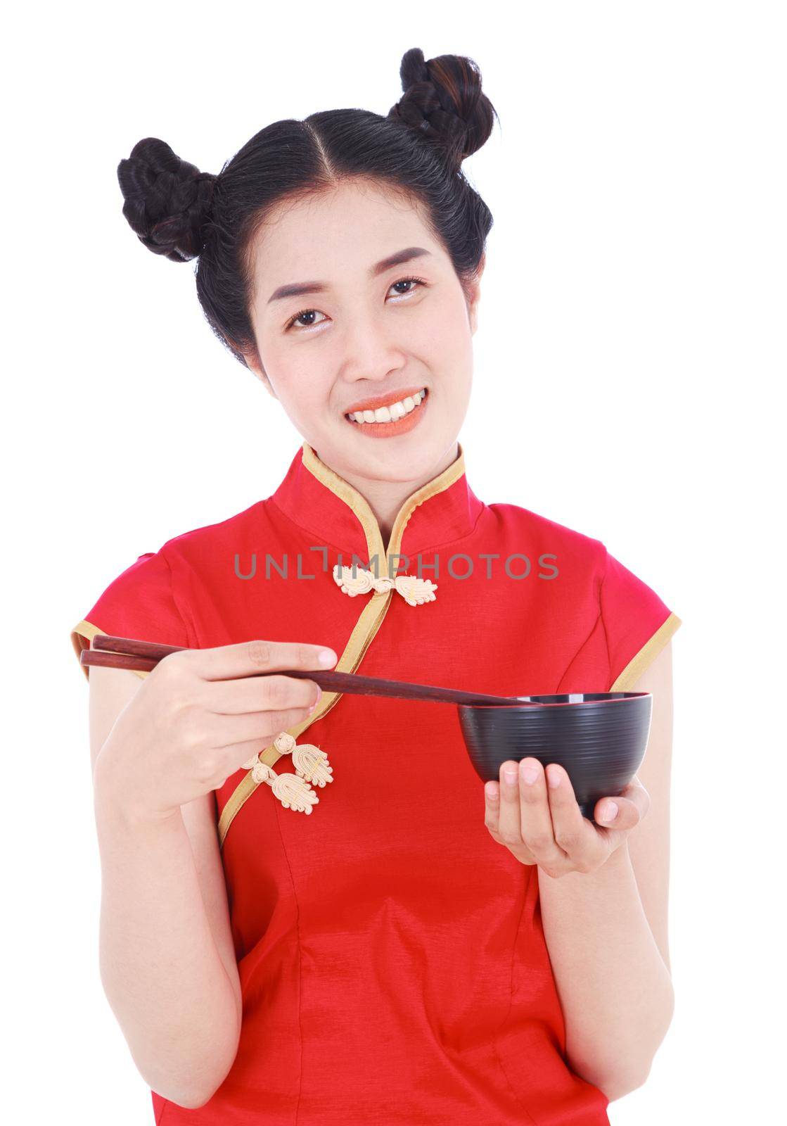 happy woman wearing chinese cheongsam dress with chopsticks and bowl isolated on a white background