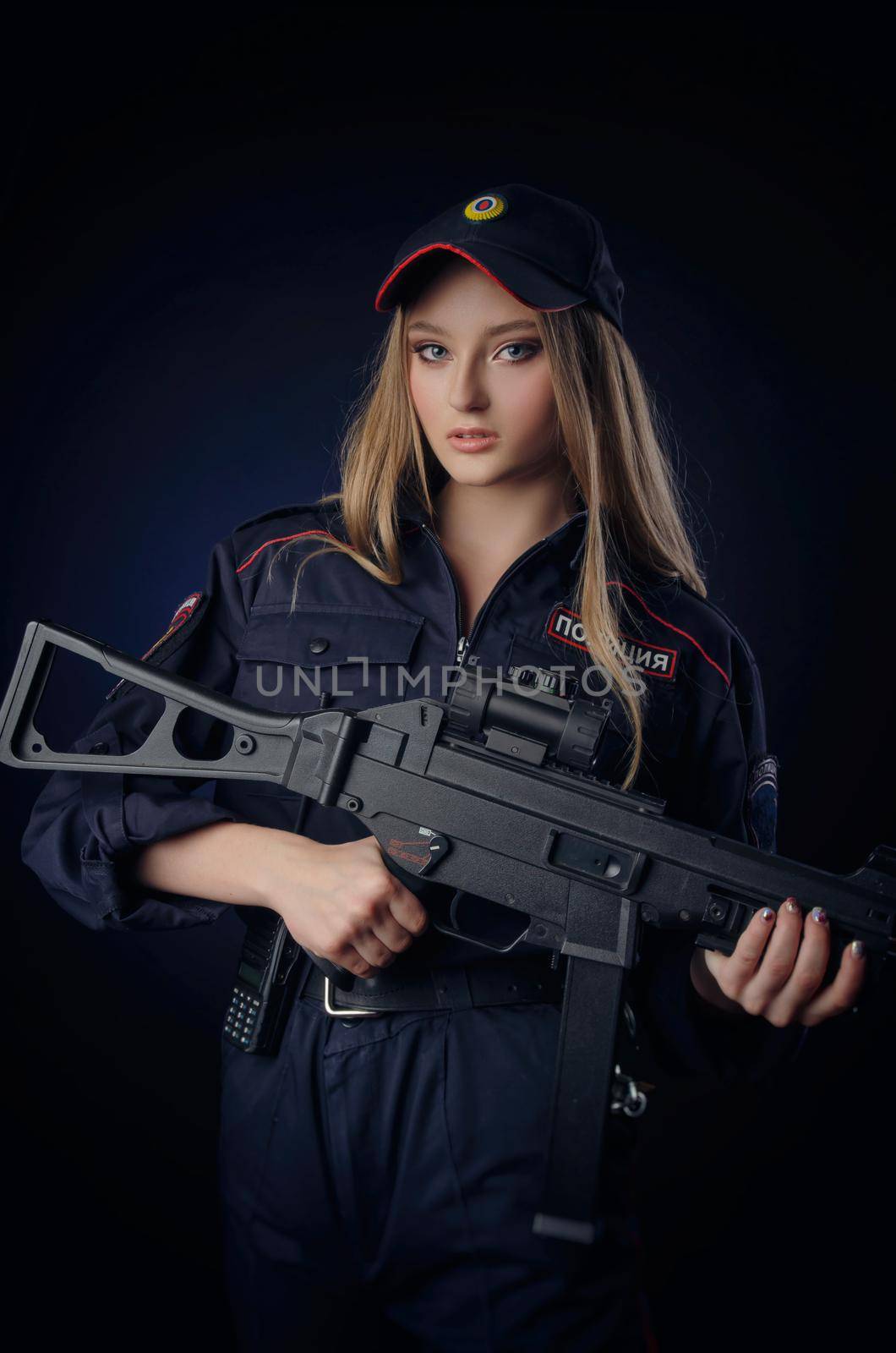 girl in the police uniform with a gun is a Russian policeman. English translation of Police