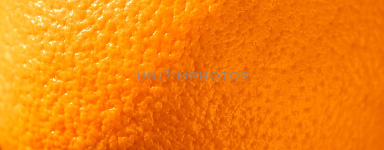 Ripe orange peel background. Close up view.