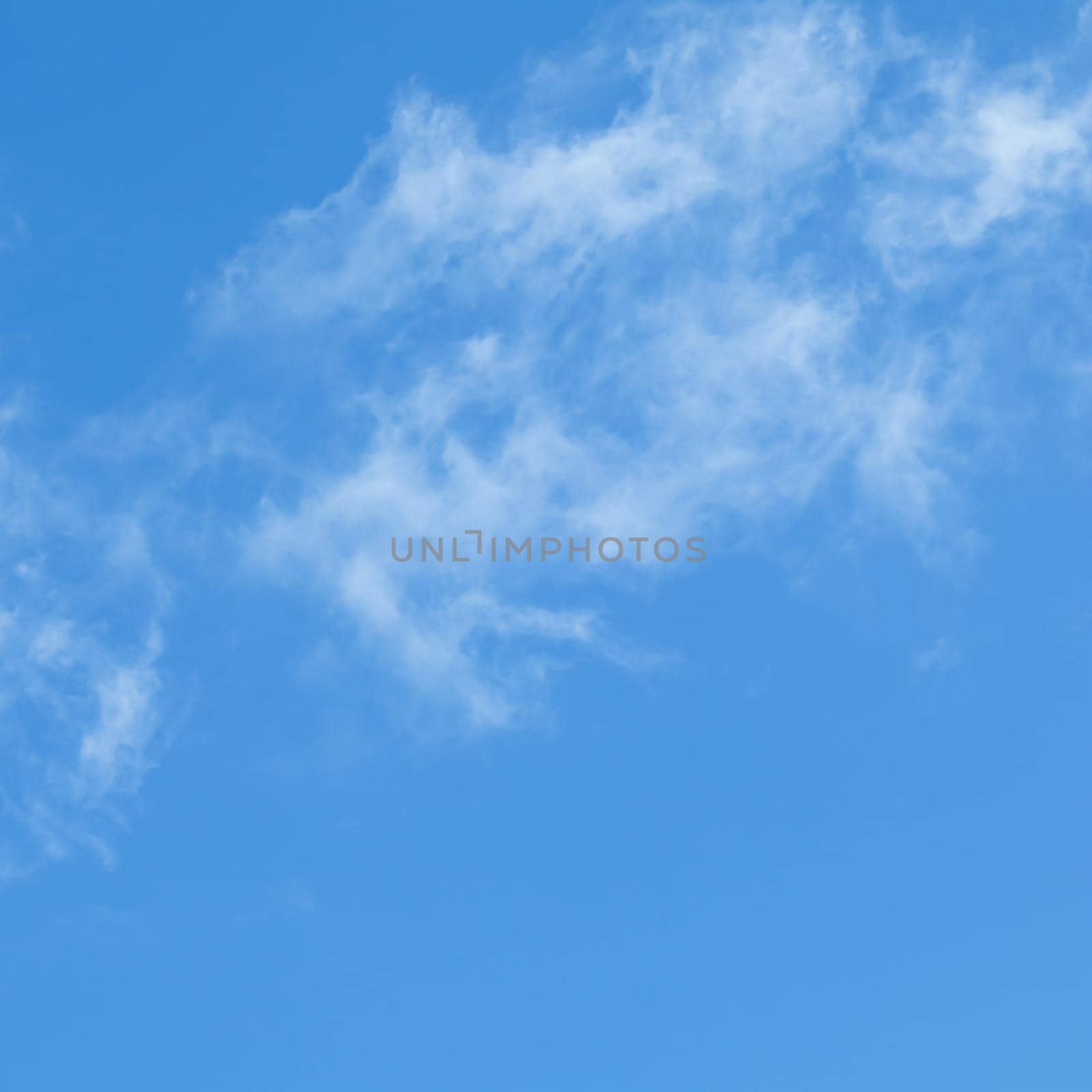 Background of blue sky with white clouds.