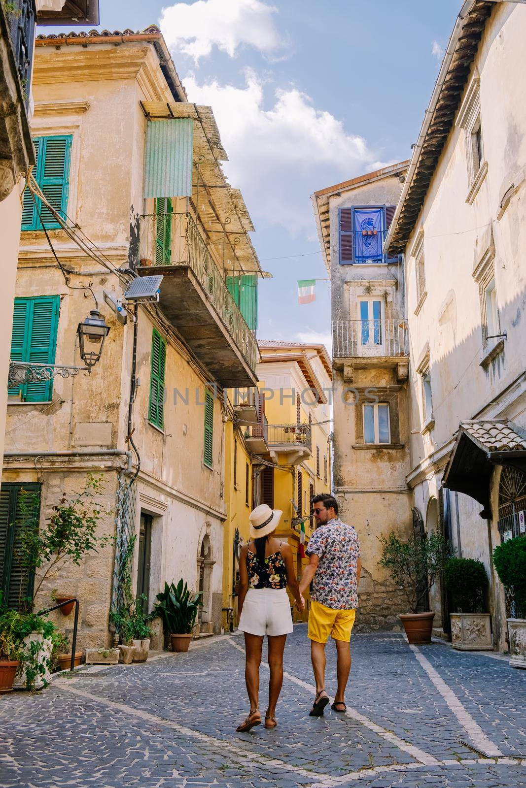 Overview of Fiuggi in Italy, Scenic sight in Fiuggi, Province of Frosinone, Lazio, central Italy. Europe, a couple walking on the colorful streets of Fiuggi. 