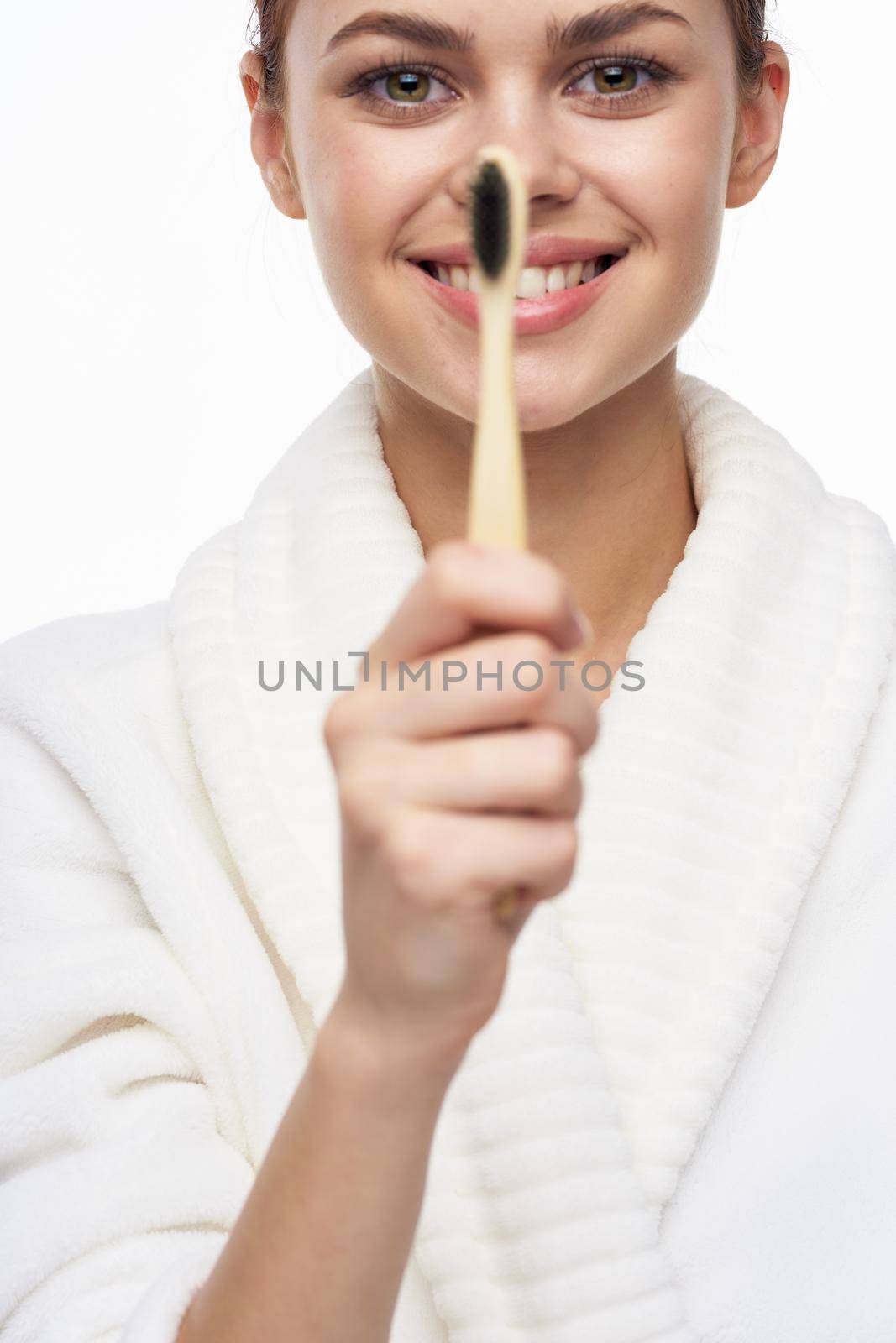 cheerful woman in white coat toothbrush dental health hygiene by Vichizh