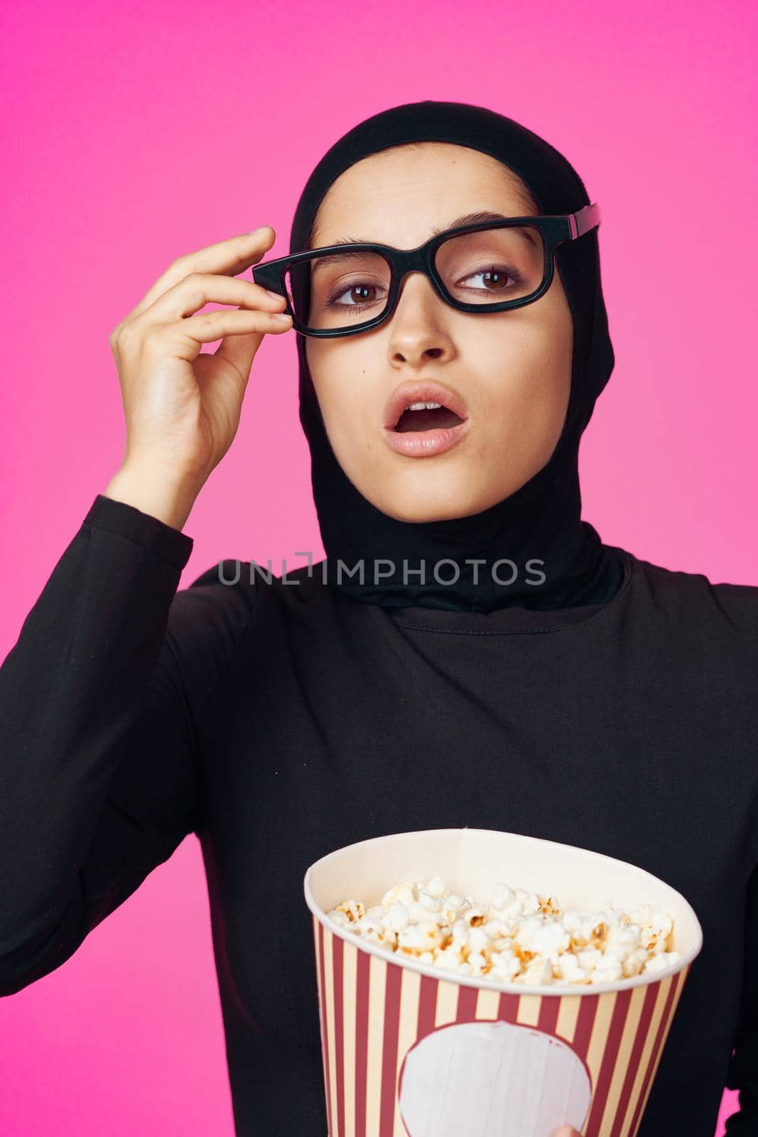 arab woman entertainment cinema popcorn fashion studio lifestyle. High quality photo