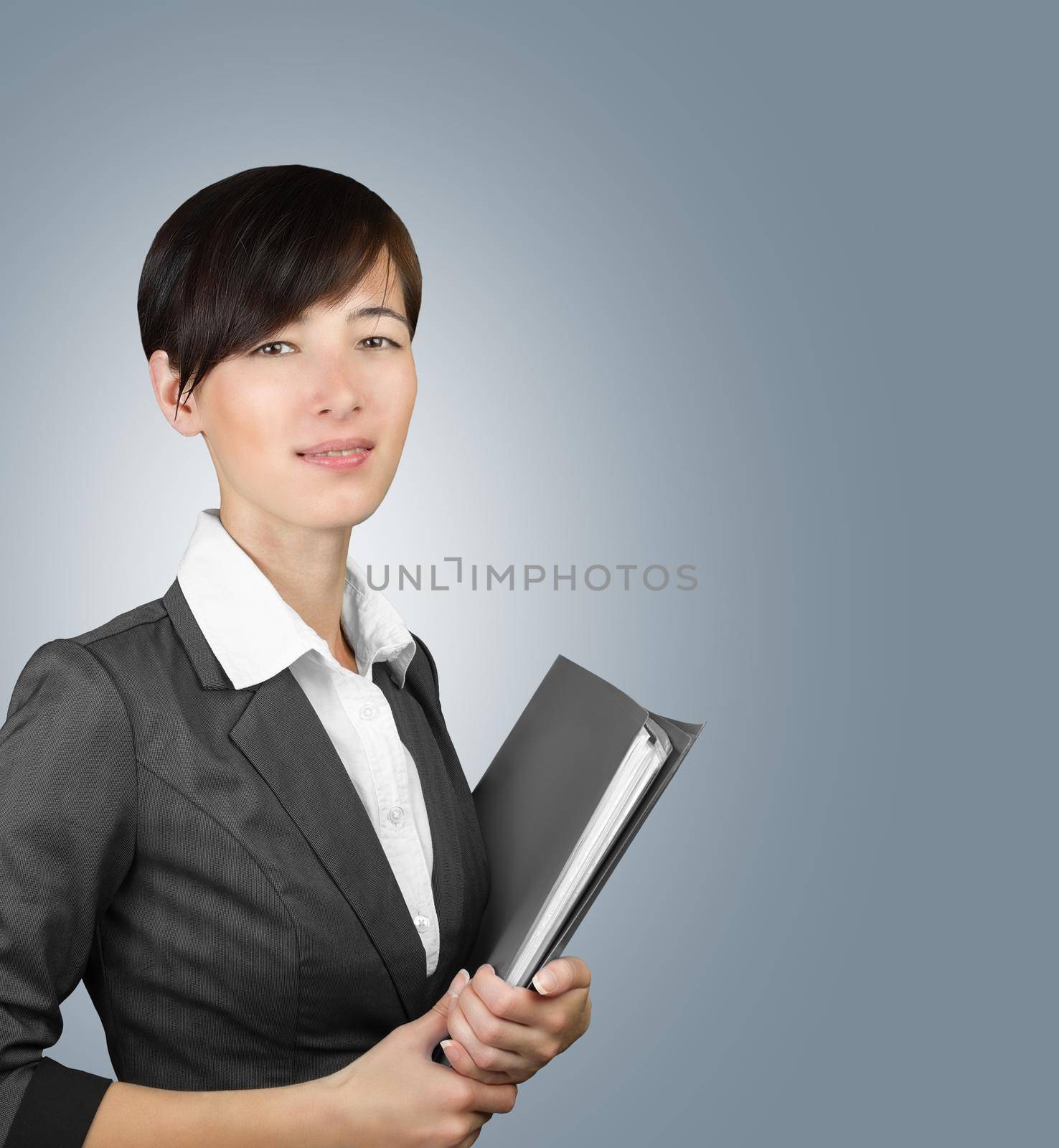 Business woman with a folder on a gray background