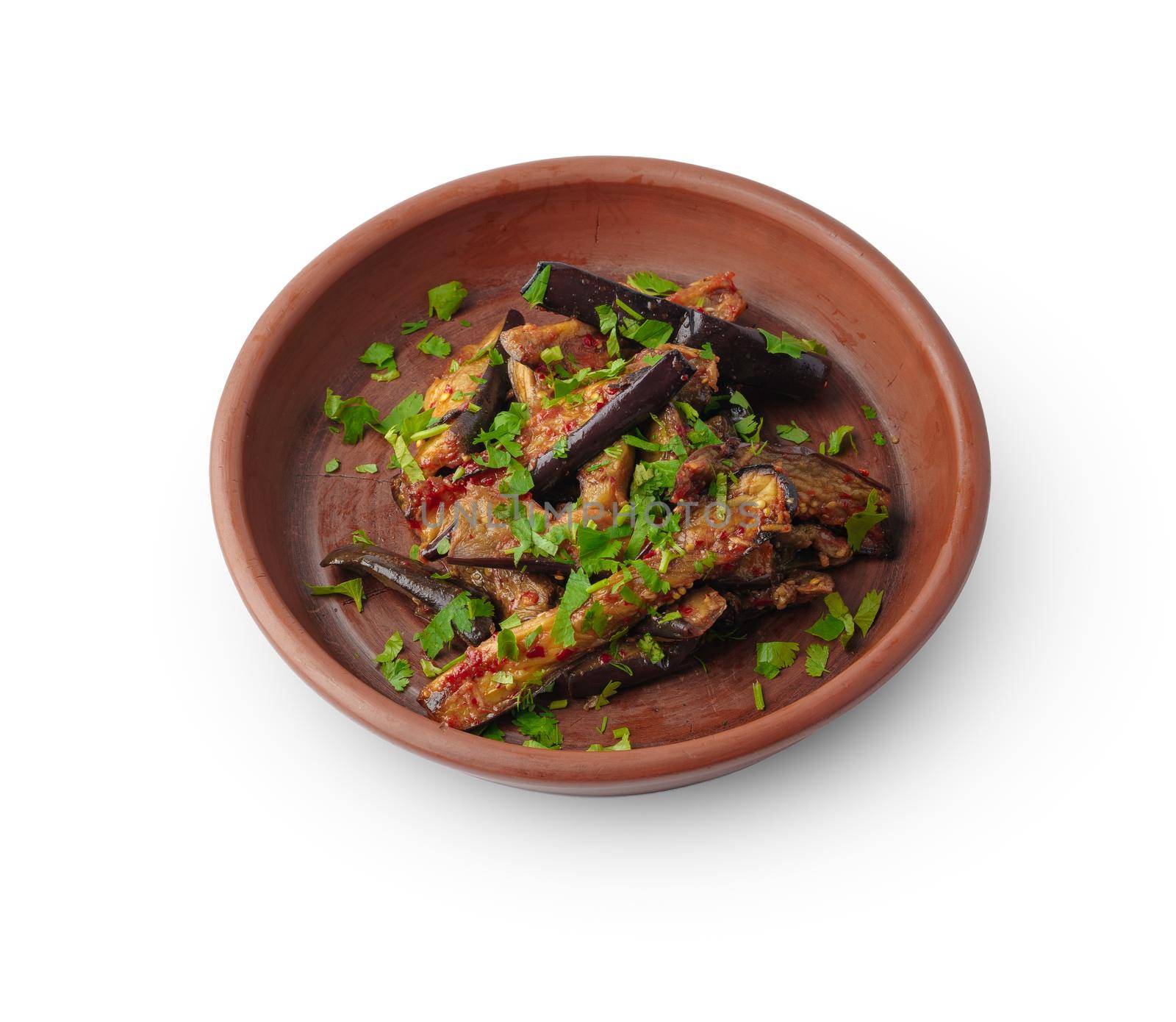 Fried eggplant slices with herbs and sauce isolated on white background