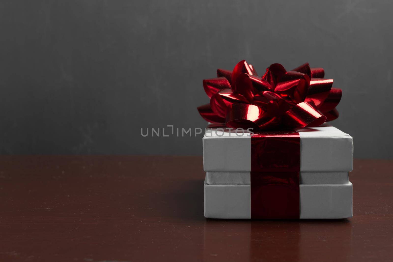 Gift box with red bow by alexAleksei