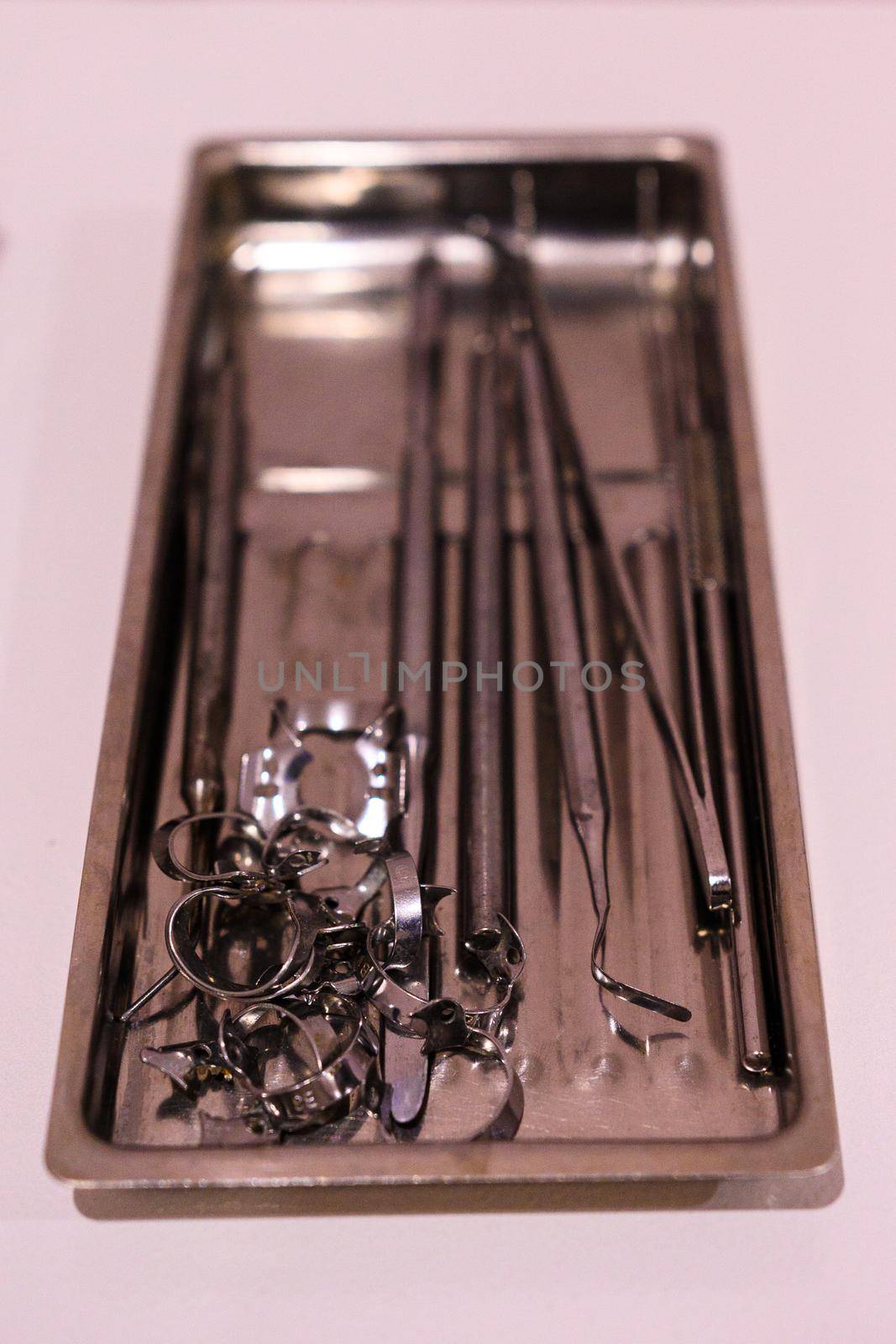Set of sterile dental instruments close up. new