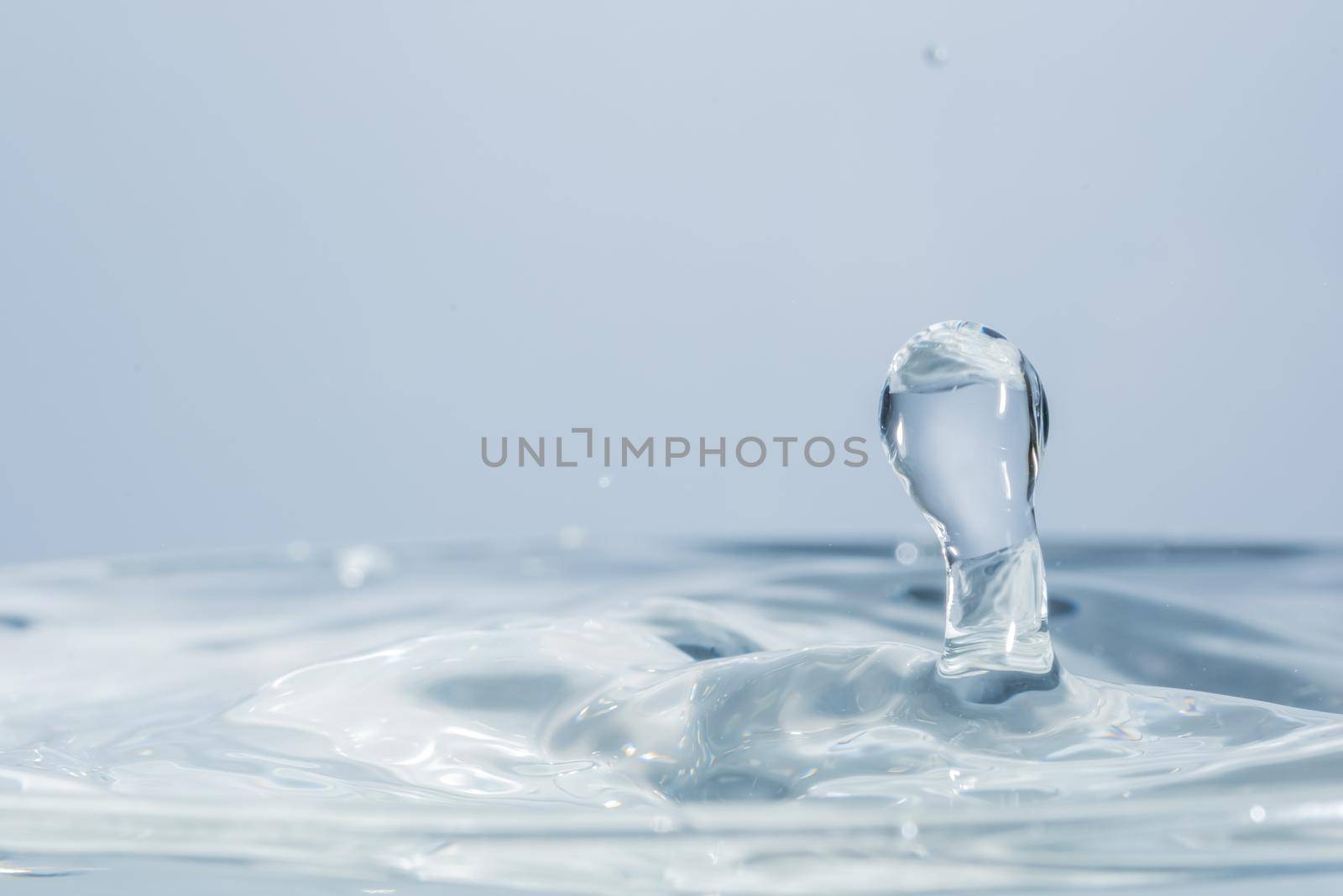 Waves and water drops by yayimage