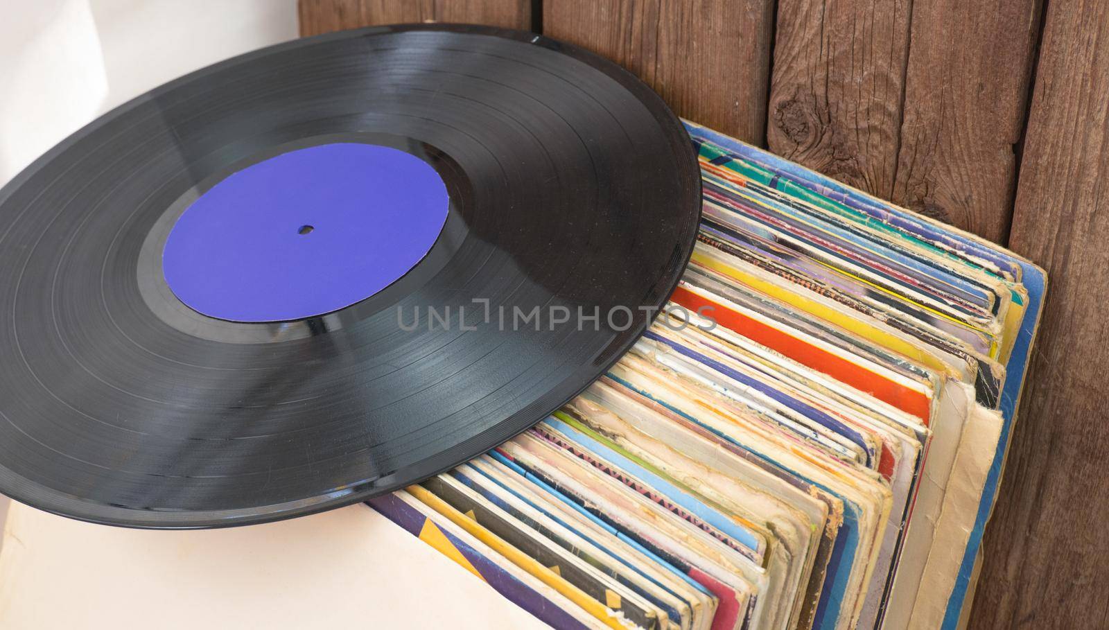 a bunch of old vinyl records. Retro music recording by Ekaterina34