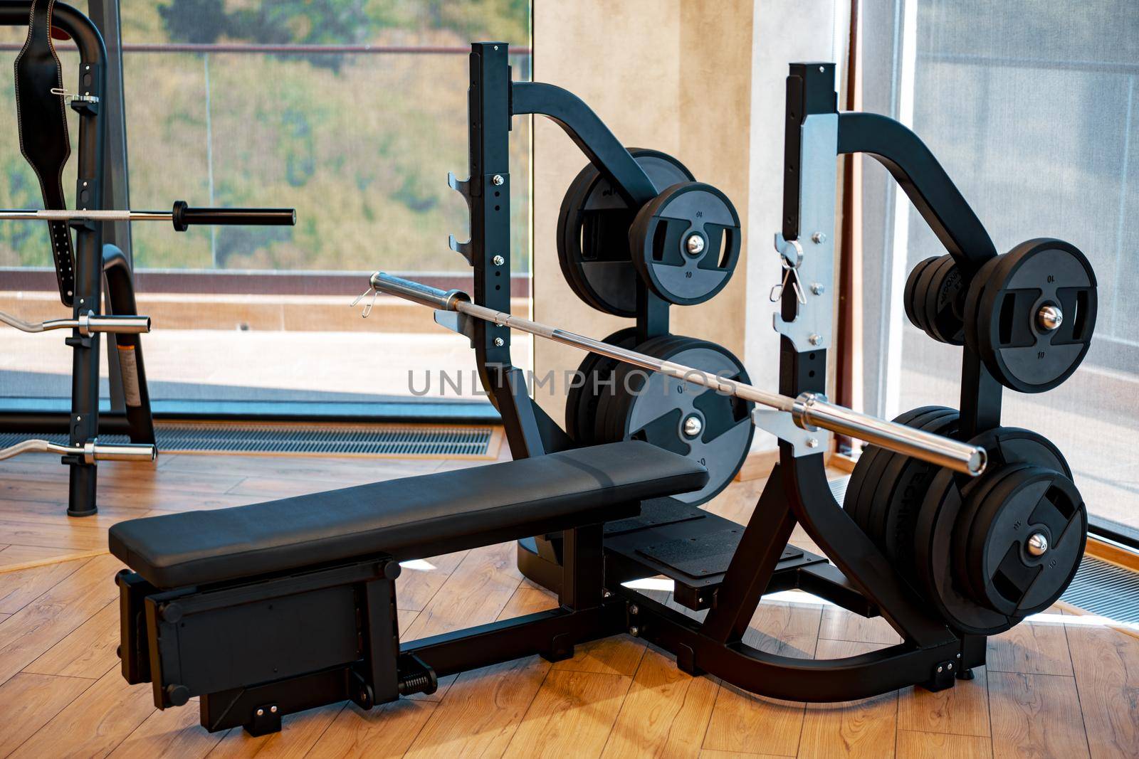 Modern gym interior with new fitness equipment, no people
