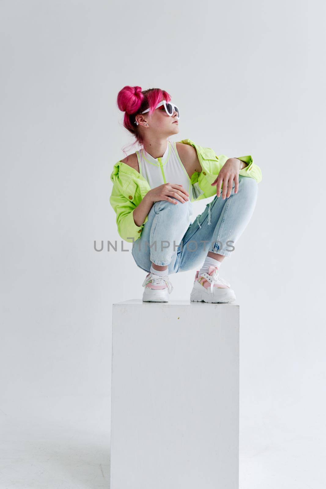 hipster woman pink hair posing fashion clothes isolated background. High quality photo