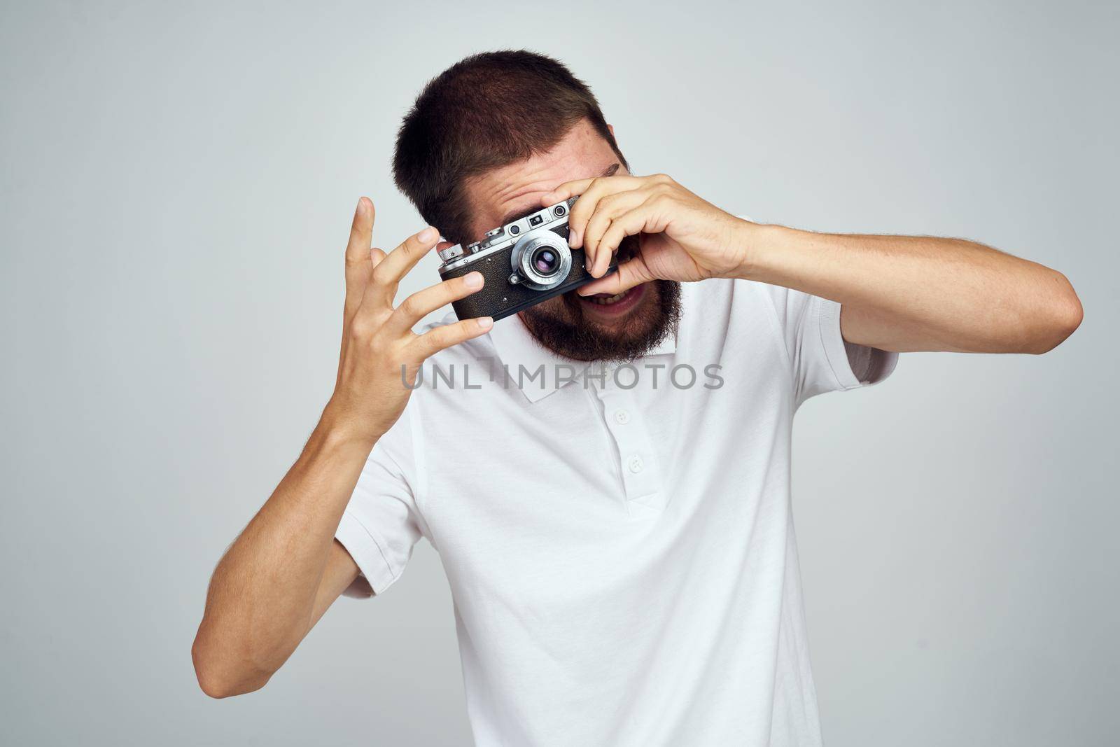 male photographer with camera office object lifestyle. High quality photo