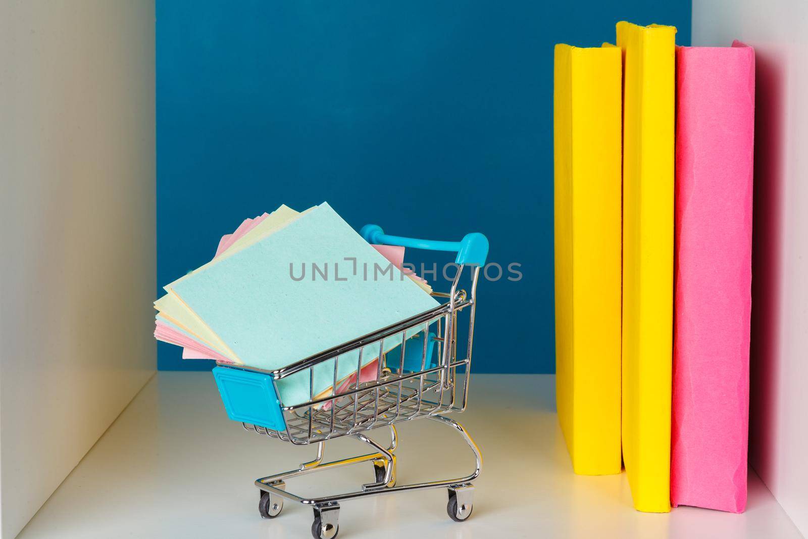 books on a wooden shelf at home or office