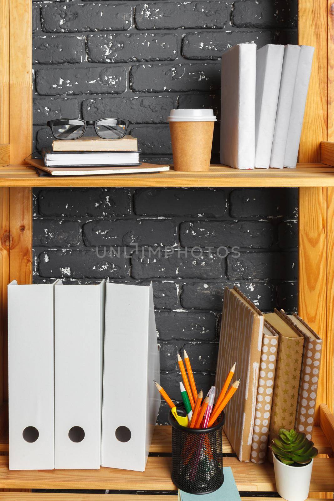 Image of wooden board with documents in office