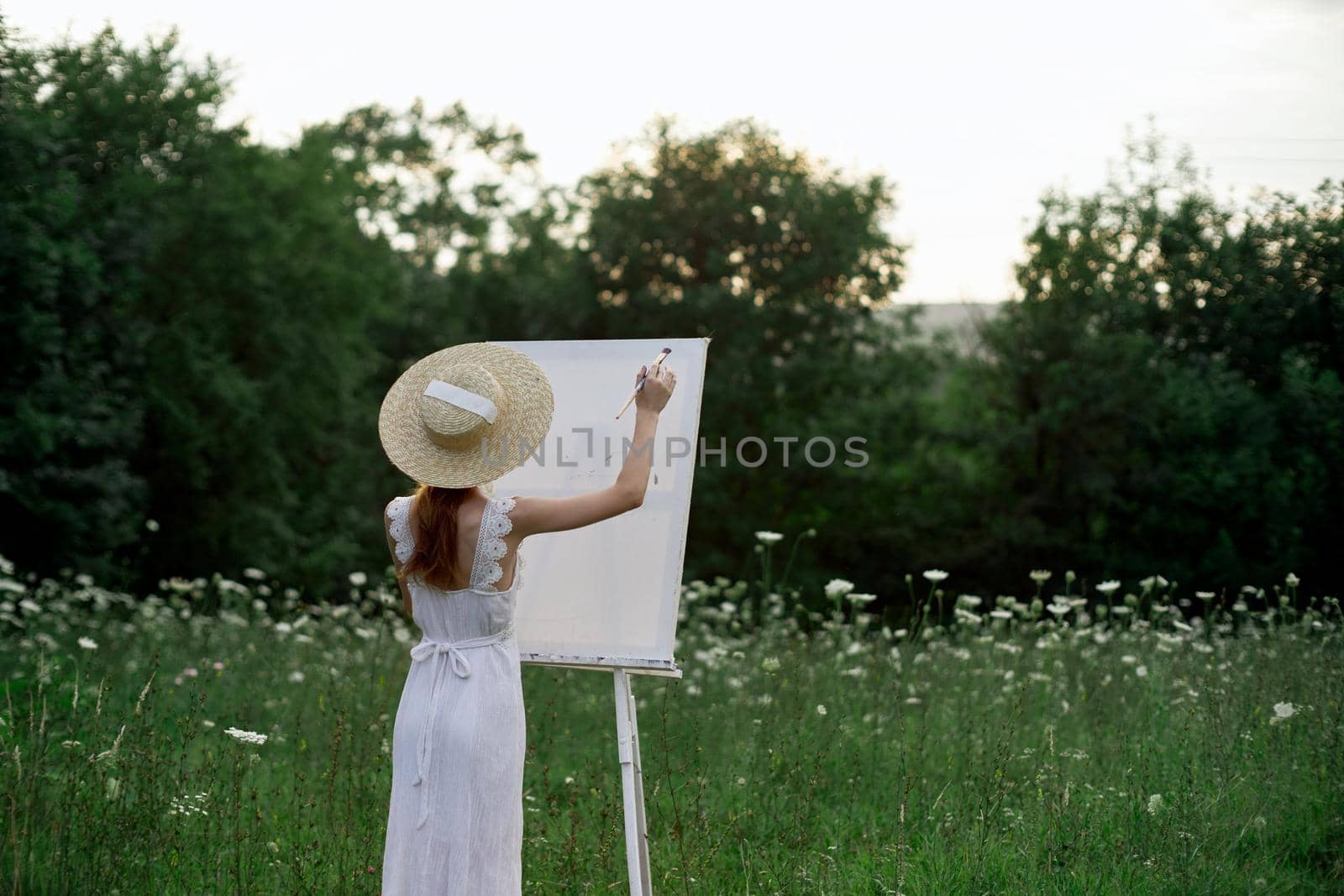 pretty woman in white dress outdoors drawing art creative by Vichizh
