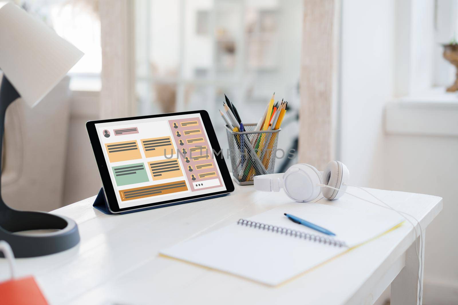 E-learning on digital tablet on white wooden table, close up