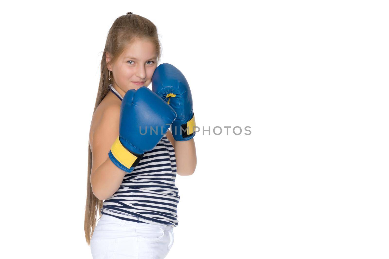 Teenage girl in boxing gloves. The concept of sport, fitness and healthy lifestyle of the younger generation. Isolated on white background.