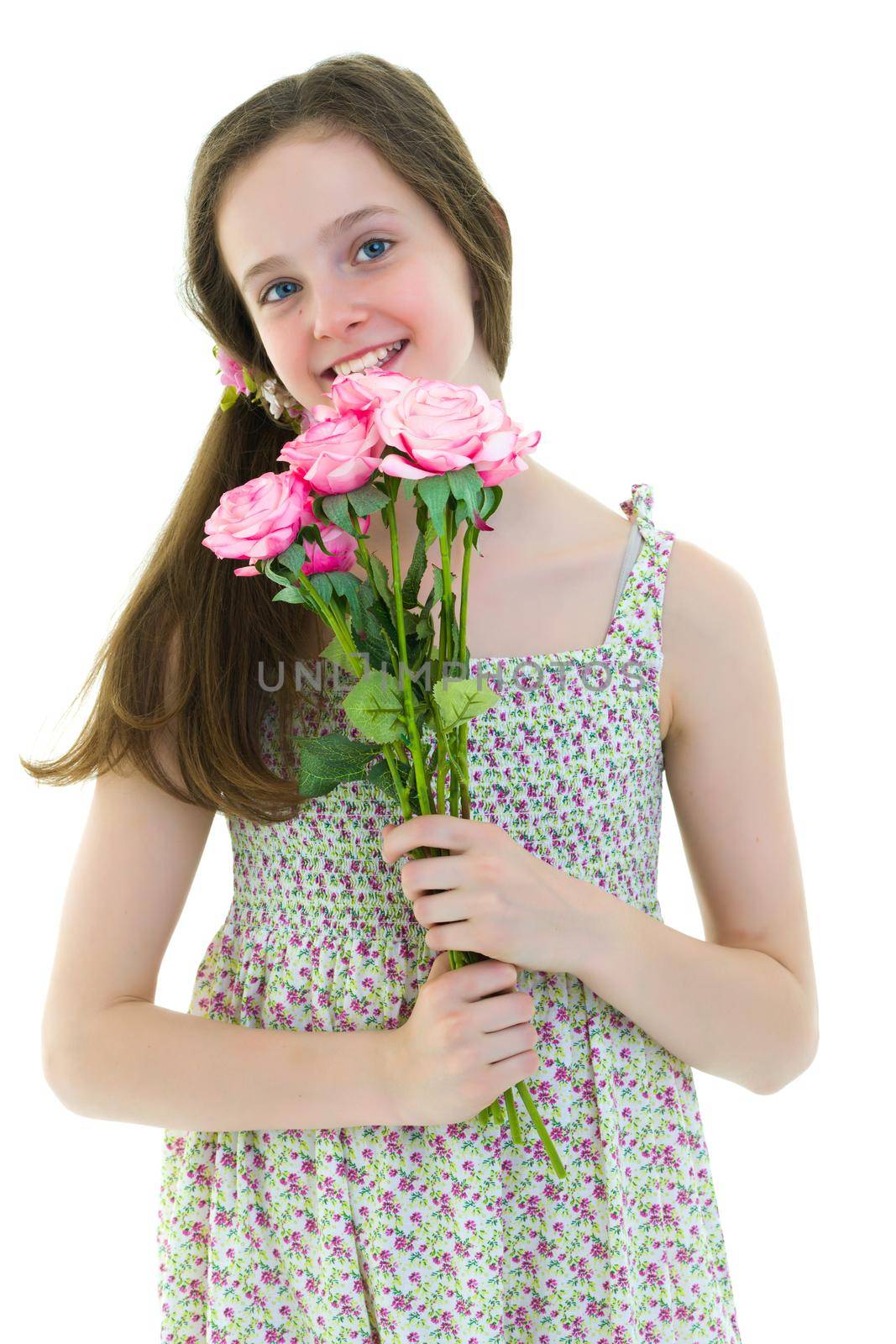 Little girl with a beautiful bouquet of flowers. The concept of holidays, family and children. Isolated on white background.