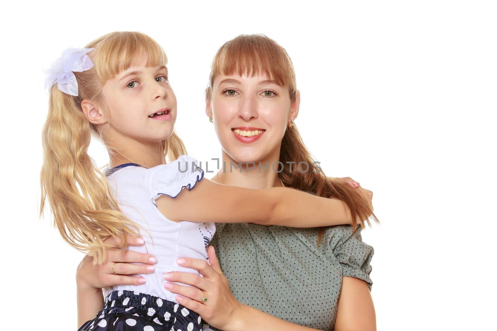 close-up-Isolated on white backgroundBeautiful young mother and adorable little daughter a gentle hug . close-up-Isolated on white background by kolesnikov_studio